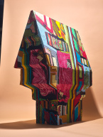 Modellhaus mit bunter, stoffähnlicher Textur