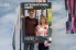 Photo: Katharina Kontowski and Maximilian Köster look through a photo frame bearing the words ‘International Week’